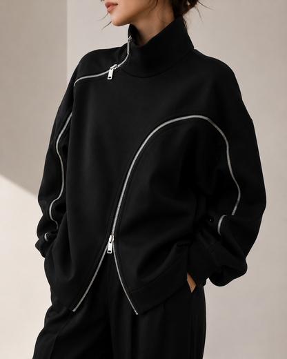 Sudadera amplia con cierre asimétrico y cuello alto